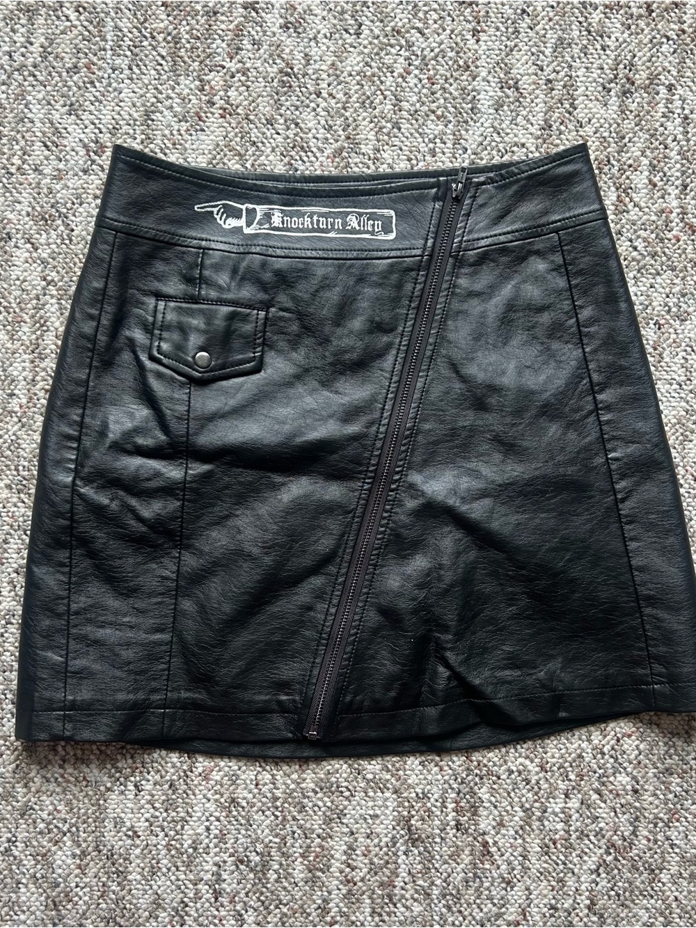 Knockturn Alley Black Faux Leather Mini Skirt with Diagonal Zip